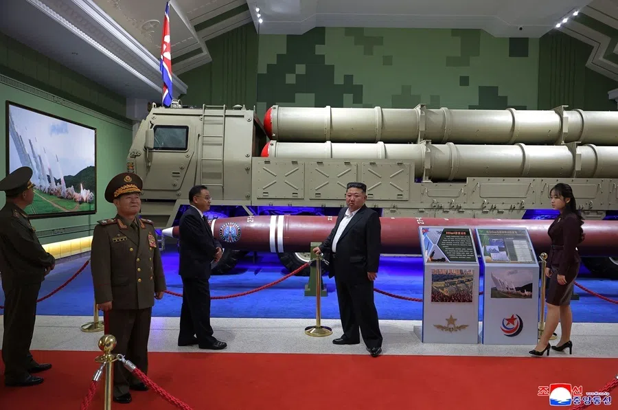 This picture taken on 11 October 2026 and released by North Korea's official KCNA on 13 October 2026 shows North Korean leader Kim Jong Un (second right) and his daughter Kim Ju Ae (right) touring the Second Economic Committee National Defense Revolution Museum in Pyongyang.