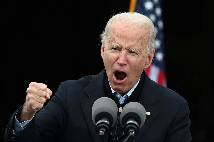 US President-elect Joe Biden gestures as he speaks during a campaign rally to support Democratic Senate candidates in Atlanta, Georgia on 15 December 2020. (Jim Watson/AFP)