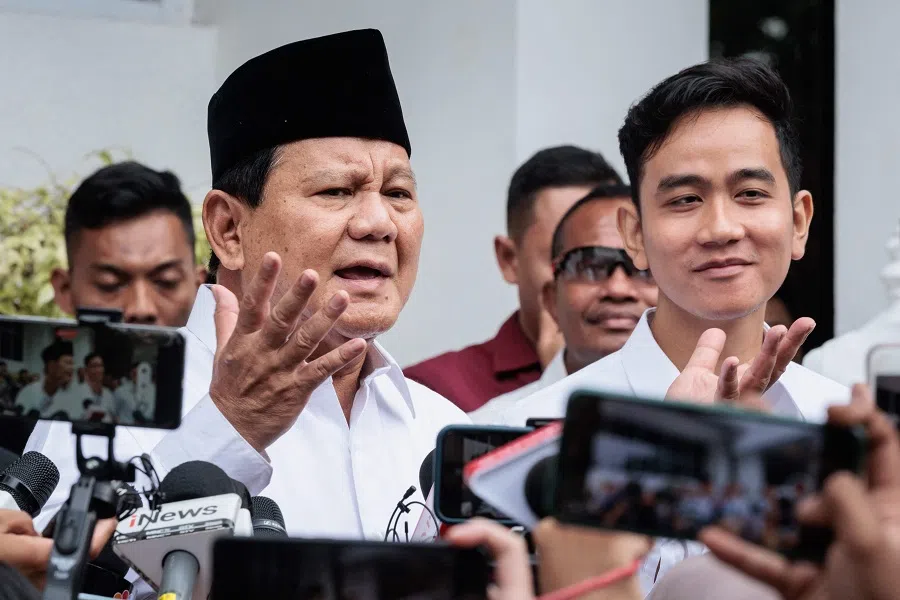 Indonesia’s President-elect Prabowo Subianto (left) speaks to the media with Vice President-elect Gibran Rakabuming Raka (right) after the plenary meeting of the General Elections Commission (KPU) announcing the 2024 presidential election at the KPU office in Jakarta, Indonesia, on 24 April 2024. (Yasuyoshi Chiba/AFP)