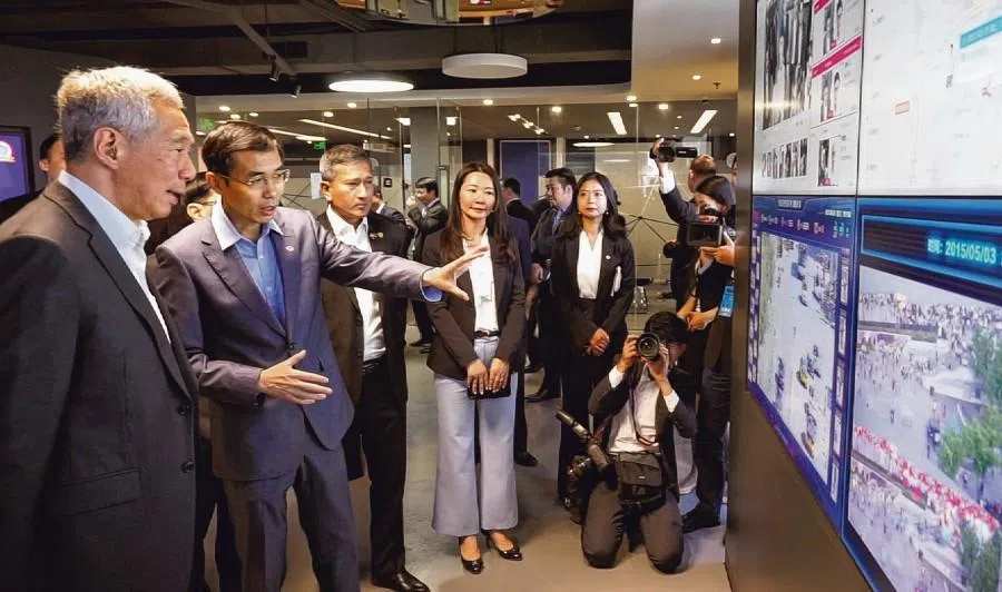 Prime Minister Lee Hsien Loong being given a tour of Chinese artificial intelligence company SenseTime when he visited Beijing in September 2017. (SPH Media)