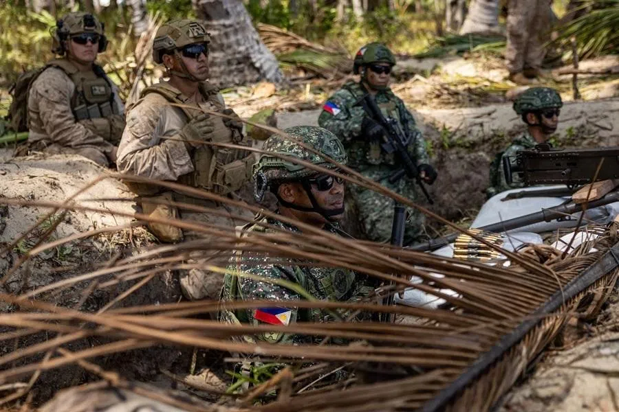 US and Philippine troops participate in counter-landing live fire exercises during Balikatan, the annual joint military exercises between the US and the Philippines, at Long Point Beach, Brgy. Aporawan, Aborlan, Palawan, Philippines, on 27 April 2026.