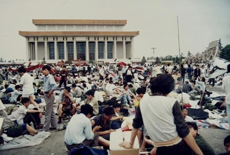 Students sitting on the ground in Tiananmen Square. The area appeared dirty and disorderly, creating sanitation problems and damaging the protesters’ public image.