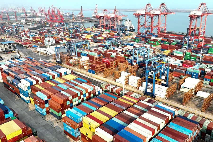 This aerial photo taken on 7 November 2022 shows containers stacked at a port in Lianyungang, Jiangsu province, China. (AFP)
