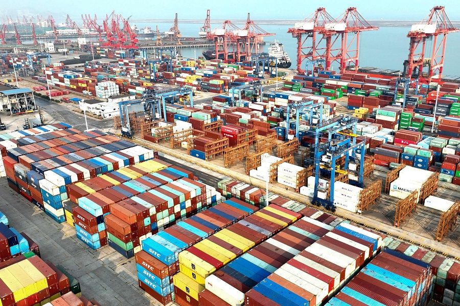 This aerial photo taken on 7 November 2022 shows containers stacked at a port in Lianyungang, Jiangsu province, China. (AFP)