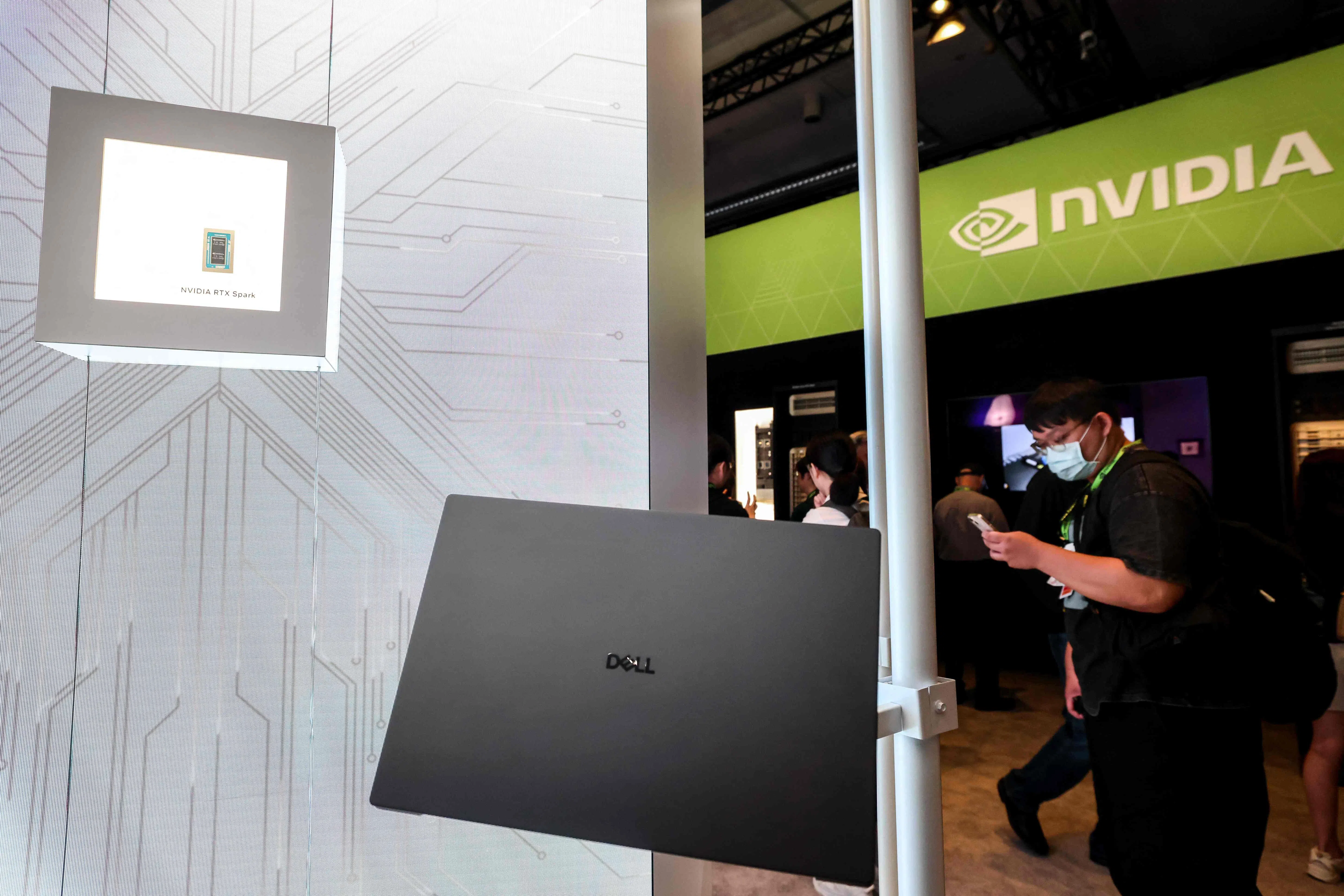 Nvidia RTX Spark chip and laptops are displayed during the Nvidia product showcase at Computex 2026 in Taipei on 3 June 2026.