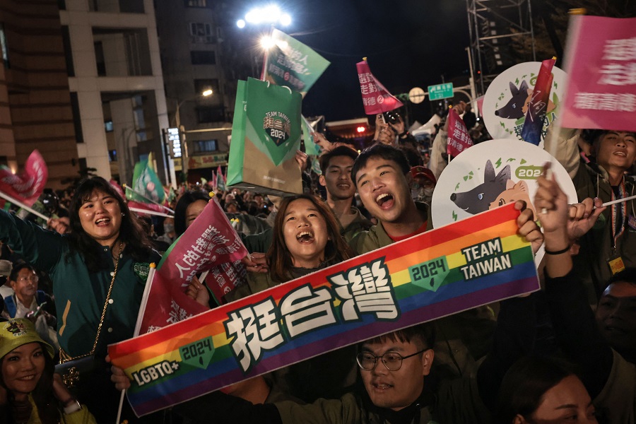 Supporters react after Taiwan's Vice President and presidential candidate of ruling Democratic Progressive Party (DPP) Lai Ching-te won the presidential election outside the party's headquarters in Taipei, Taiwan on 13 January 2024. (Yasuyoshi Chiba/AFP)