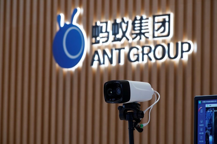 A thermal imaging camera is seen in front of a logo of Ant Group at the headquarters of Ant Group, an affiliate of Alibaba, in Hangzhou, Zhejiang province, China, 29 October 2020. (Aly Song/File Photo/Reuters)