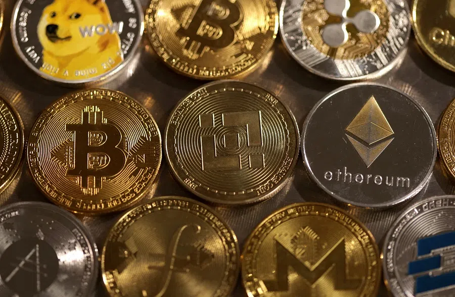 Representations of cryptocurrencies are seen in this illustration, on 10 August 2022.