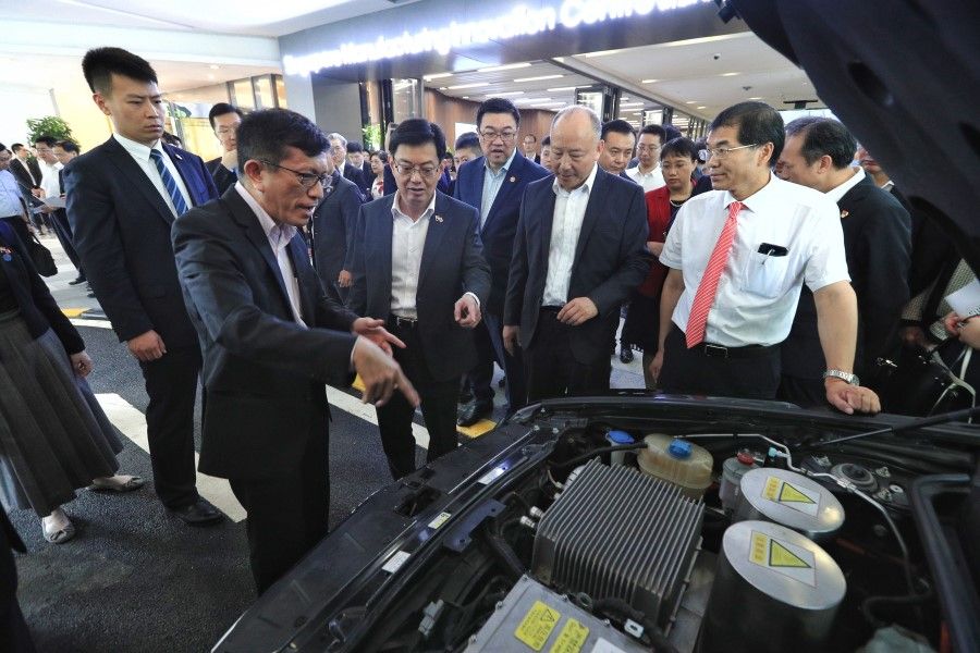 DPM Heng Swee Keat was shown a fuel cell car developed by the Sino-Singapore International Joint Research Institute at the Sino-Singapore Guangzhou Knowledge City in May 2019. (Ministry of Communications and Information)