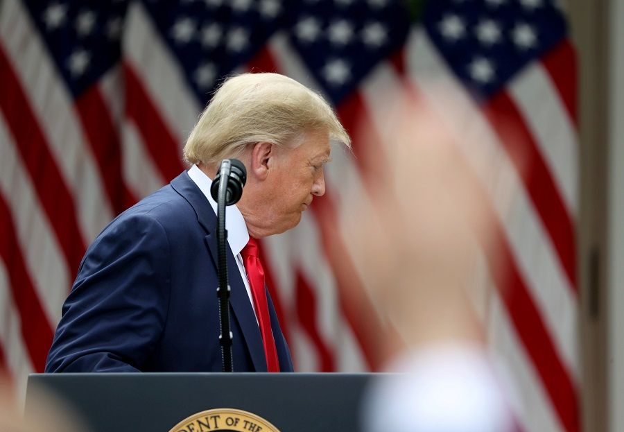 US President Donald Trump turns away and departs as reporters try to ask questions after the president made an announcement about US trade relations with China and Hong Kong in the Rose Garden of the White House in Washington, US, on 29 May 2020. (Jonathan Ernst/Reuters)
