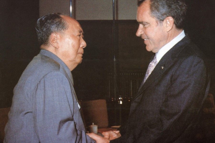 In this file photo former Chinese communist leader Chairman Mao Zedong (L) welcomes former US President Richard Nixon at his house in the Forbidden City in Beijing on 22 February 1972. (Handout/AFP)