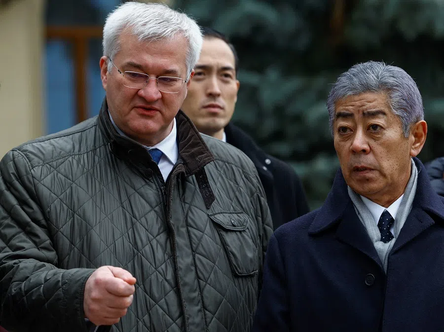 Japanese Foreign Minister Takeshi Iwaya and Ukrainian Foreign Minister Andrii Sybiha visit the Saint Michael’s Cathedral, amid Russia’s attack on Ukraine, in Kyiv, Ukraine, on 16 November 2024. (Valentyn Ogirenko/Reuters)
