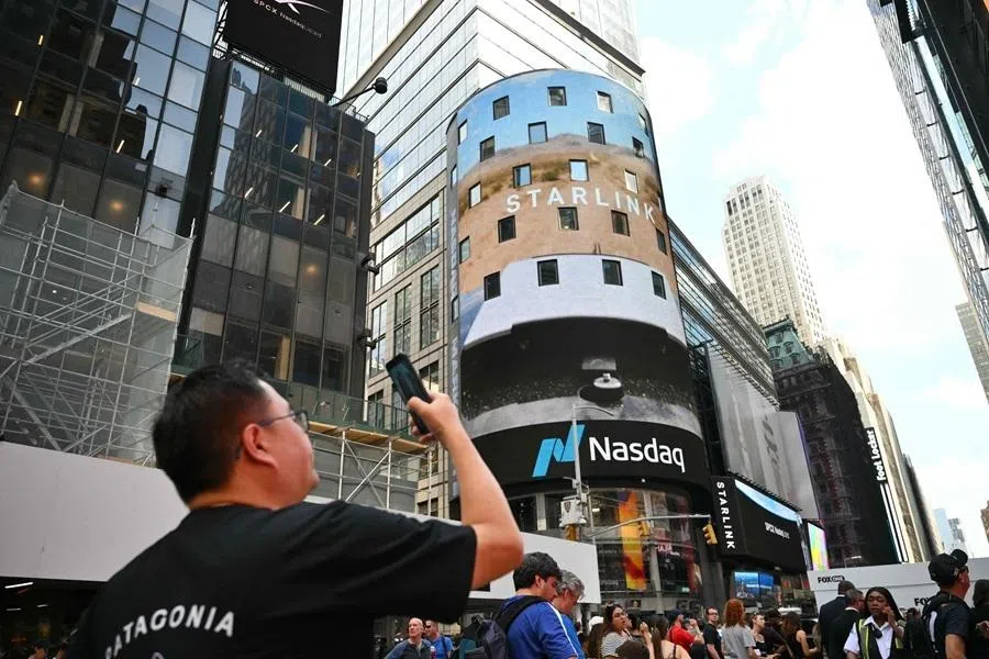 An ad for Elon Musk's Starlink is displayed on a screen at Times Square after the launch of SpaceX’s initial public offering (IPO) in New York, on 12 June 2026.