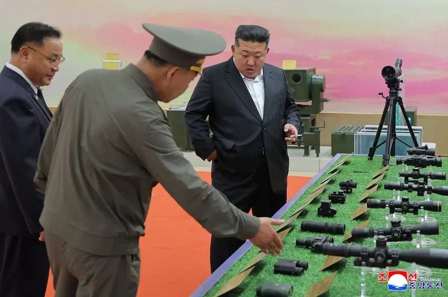 This picture taken on 11 October 2026 and released by North Korea's official KCNA on 13 October 2026 shows North Korean leader Kim Jong Un (centre) touring the Second Economic Committee National Defense Revolution Museum in Pyongyang.