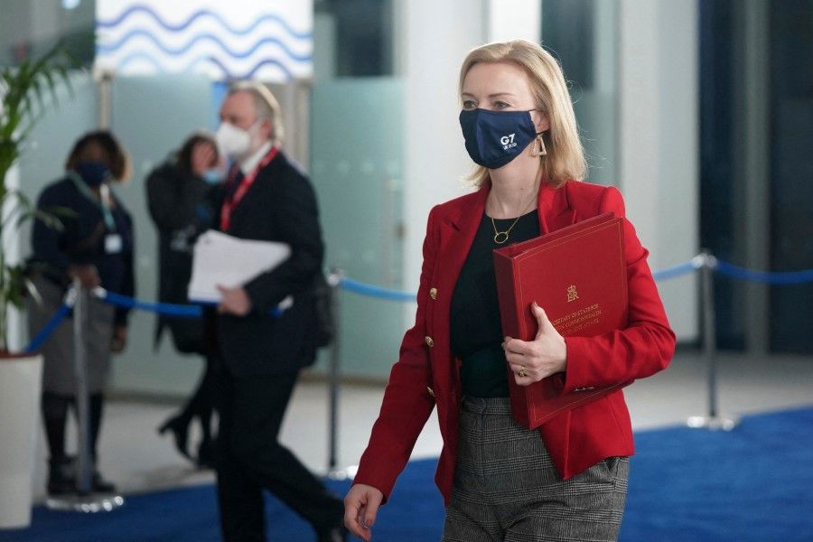Britain's Foreign Secretary Liz Truss, arrives to attend a G7 foreign and development ministers session with guest countries and ASEAN nations in Liverpool, Britain, 12 December 2021. (Jon Super/AFP)
