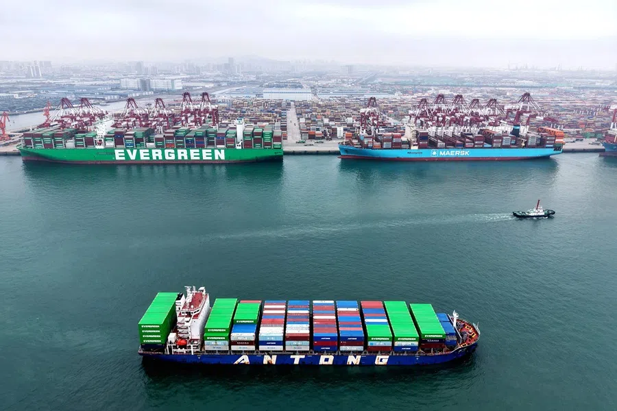 Ships are seen at the container terminal of the port in Qingdao, in China’s eastern Shandong province on 11 October 2025. (AFP)