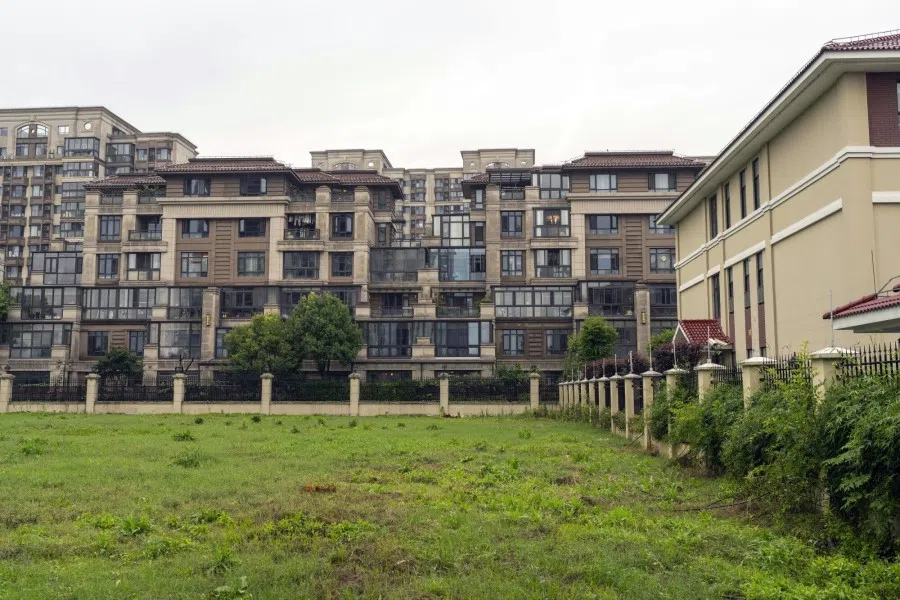 Residential buildings in Shanghai, China, on 18 June 2023. (Raul Ariano/Bloomberg)
