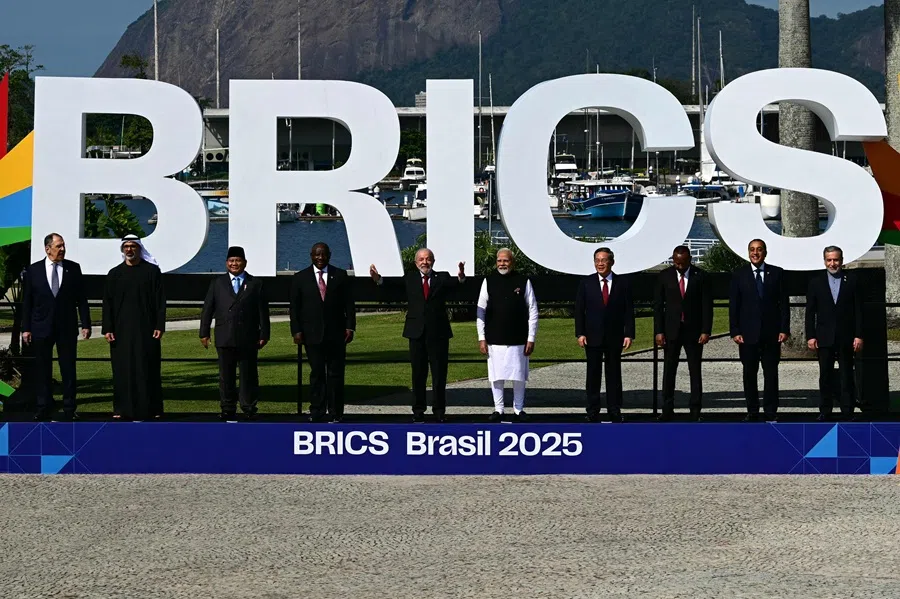 Russia’s Foreign Minister Sergey Lavrov, Crown Prince of Abu Dhabi and Representative of the Executive Council of the UAE Emirate of Abu Dhabi Sheikh Khaled bin Mohamed Al Nahyan, Indonesia’s President Prabowo Subianto, South Africa’s President Cyril Ramaphosa, Brazil’s President Luiz Inacio Lula da Silva, India’s Prime Minister Narendra Modi, China’s Premier Li Qiang, Ethiopia’s Prime Minister Abiy Ahmed, Egypt’s Prime Minister Mostafa Madbouly, and Iran’s Foreign Minister Abbas Araghchi pose for a family photo during the BRICS summit in Rio de Janeiro, Brazil, on 6 July 2025. (Pablo Porciuncula/AFP)