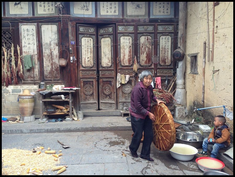 Often in rural China, a couple would travel far to find work in cities, leaving their offspring behind with their grandparents as pictured here in rural Yunnan.