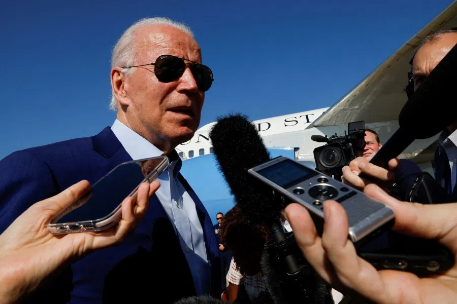 US President Joe Biden speaks to the media as he arrives at Joint Base Andrews, Maryland, US, 20 July 2022. (Jonathan Ernst/Reuters)