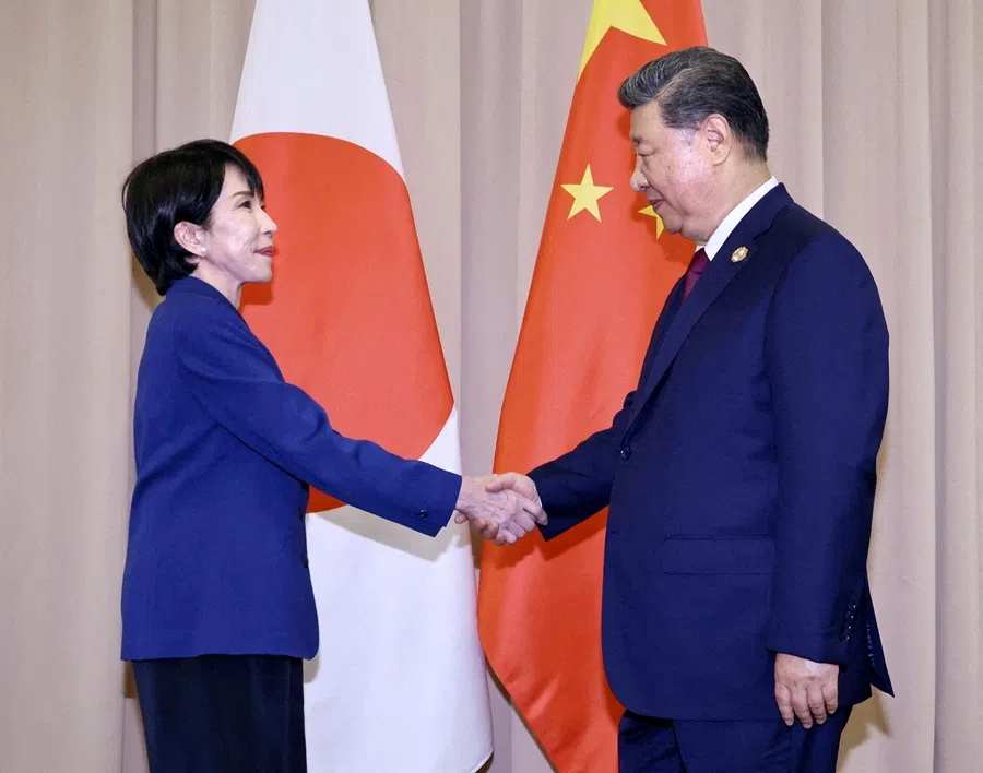 Japanese Prime Minister Sanae Takaichi shakes hands with Chinese President Xi Jinping ahead of their talks in Gyeongju, South Korea, 31 October 2025 in this photo distributed by Kyodo. (Kyodo via Reuters)