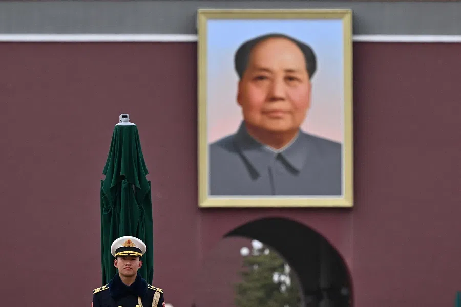 A Chinese People’s Liberation Army (PLA) soldier stands guard in front of a portrait of late communist leader Mao Zedong at Tiananmen Gate in Beijing, China, on 3 March 2025. (Pedro Pardo/AFP)