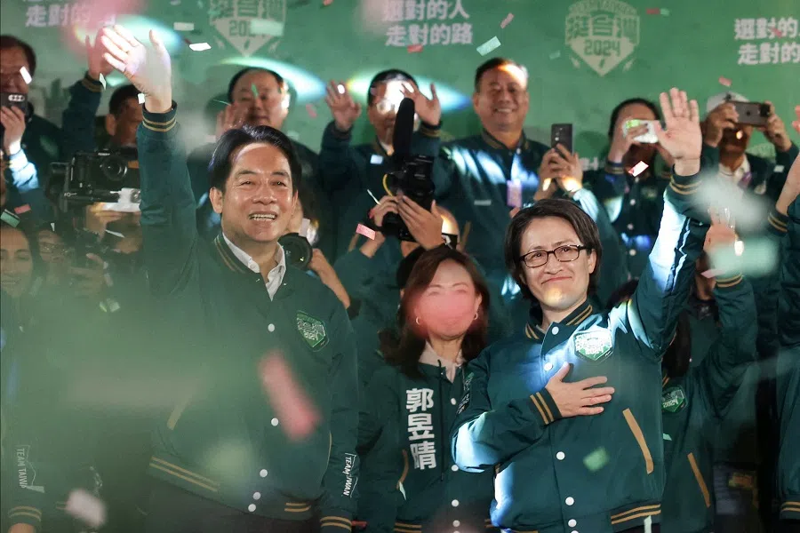 Taiwan's President-elect Lai Ching-te (left) and his running mate Hsiao Bi-khim attend a rally outside the headquarters of the Democratic Progressive Party (DPP) in Taipei, Taiwan, on 13 January 2024, after winning the presidential election. (Alastair Pike/AFP)