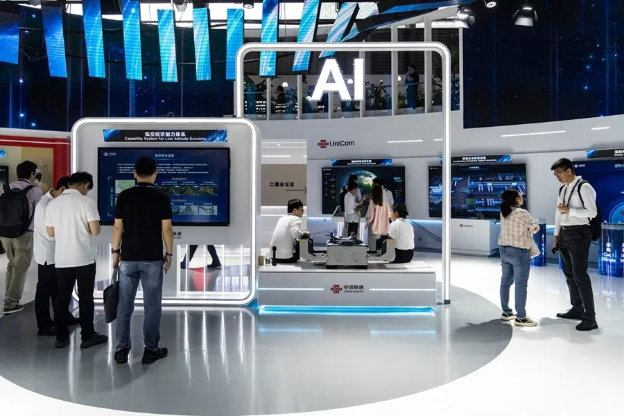 Signage for artificial intelligence at the China Unicom Hong Kong Ltd. booth at the MWC Shanghai tech show in Shanghai, China, on 19 June 2025. (Qilai Shen/Bloomberg)