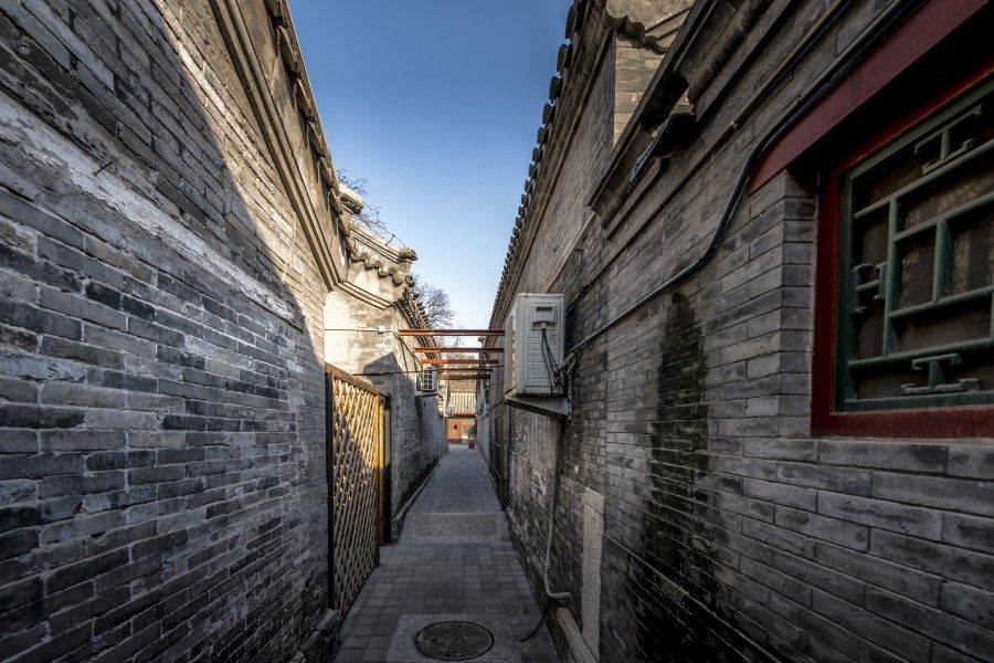 A narrow passage in a hutong in downtown Beijing, China, 2018. (iStock)