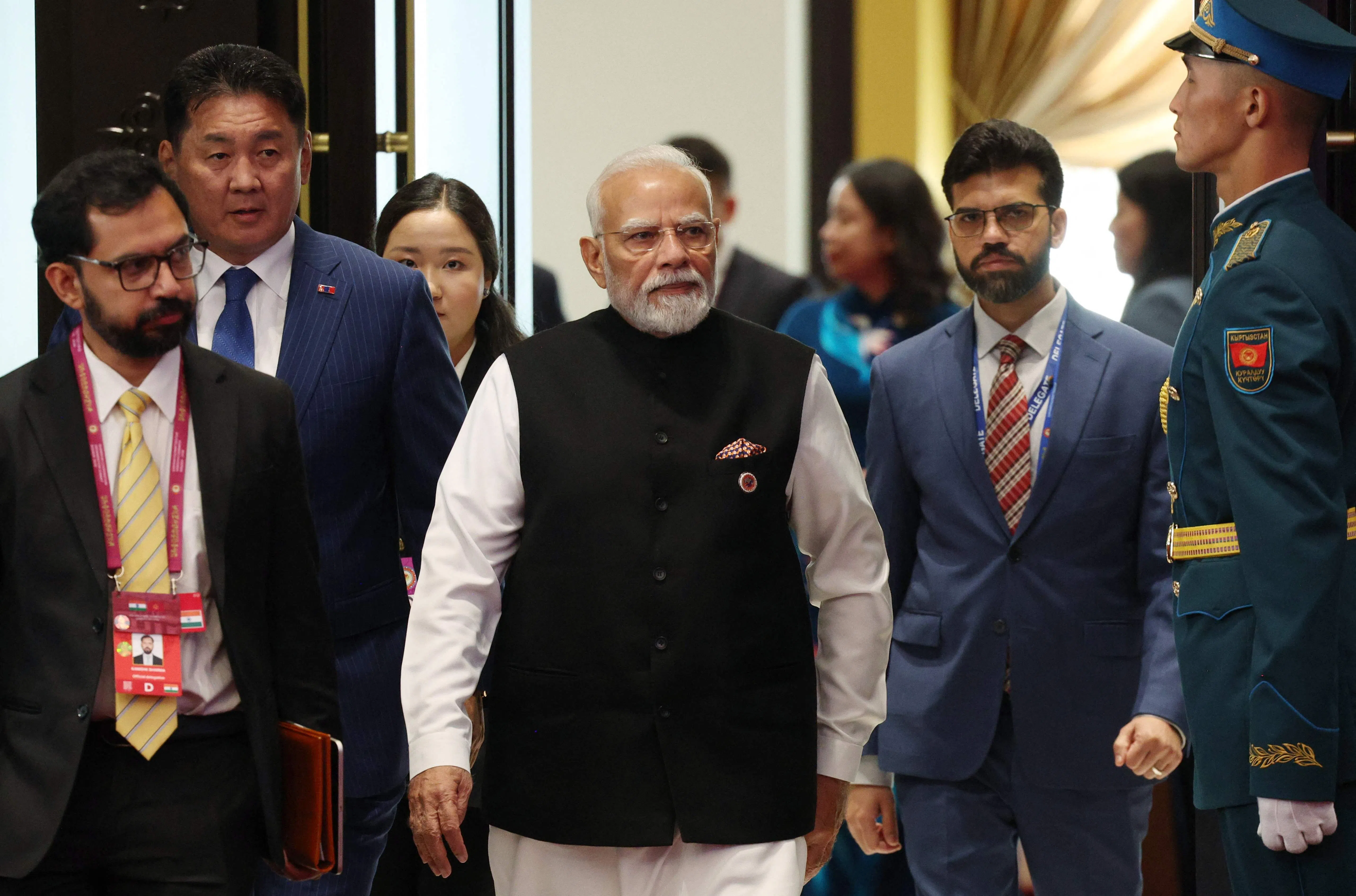 In this pool photograph distributed by the Russian state agency Sputnik, India's Prime Minister Narendra Modi walks during the Shanghai Cooperation Organisation (SCO) summit in Bishkek on 1 September 2026.