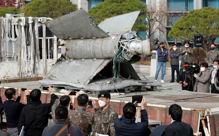 The debris of a North Korean SA-5 missile according to South Korea's military, is seen at the Defence Ministry in Seoul on 9 November 2022. (Yonhap/AFP)