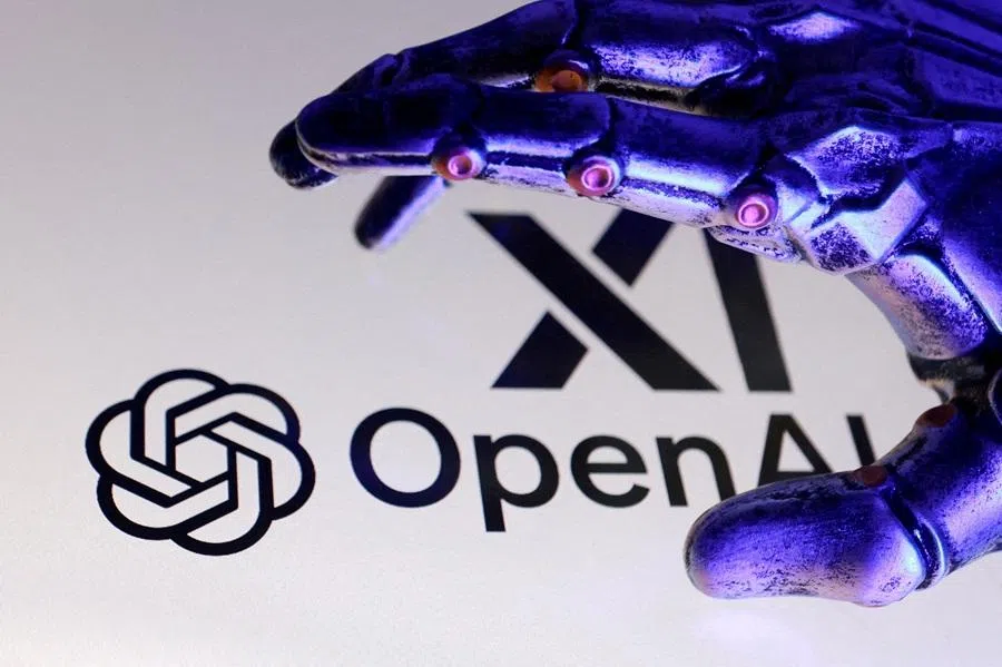 Open AI and xAI logos are seen in this illustration created on 12 September 2025. (Dado Ruvic/Reuters)