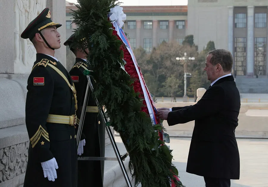 Russia’s deputy head of the Security Council Dmitry Medvedev attends a wreath-laying ceremony at the Monument to the People’s Heroes in Tiananmen Square in Beijing, China, on 11 December 2024. (Ekaterina Shtukina/Pool via Reuters)