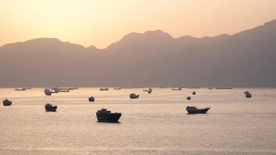 Ships and boats in the Strait of Hormuz, Musandam Governorate, Oman, 1 May 2026. (Stringer/Reuters)