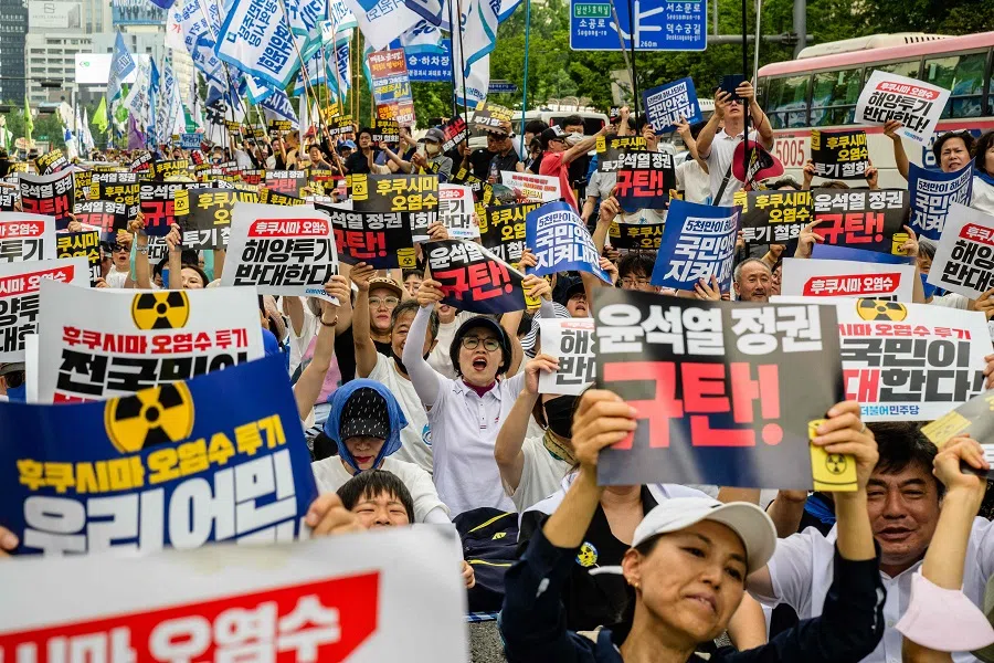 Thousands of people take part in a rally in Seoul, South Korea, on 26 August 2023, to protest against Japan's discharge of treated wastewater from the crippled Fukushima nuclear power plant. (Anthony Wallace/AFP)
