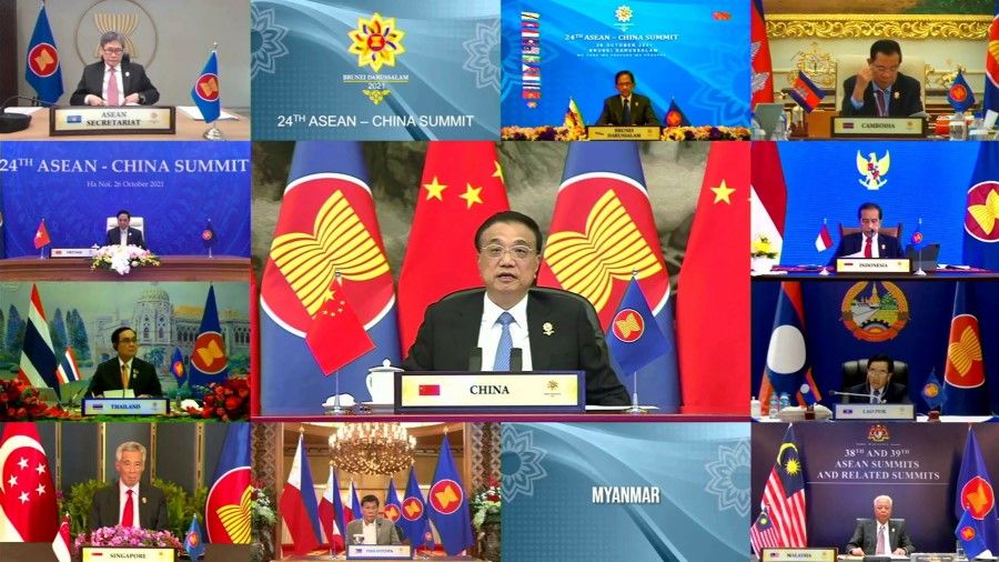 This handout photo released by the host broadcast, ASEAN Summit 2021, on 26 October 2021 shows Chinese Premier Li Keqiang (centre) taking part in the ASEAN-China Summit on the sidelines of the 2021 ASEAN summits held online on a live video conference in Bandar Seri Begawan, Brunei. (Handout/ASEAN Summit 2021/AFP)