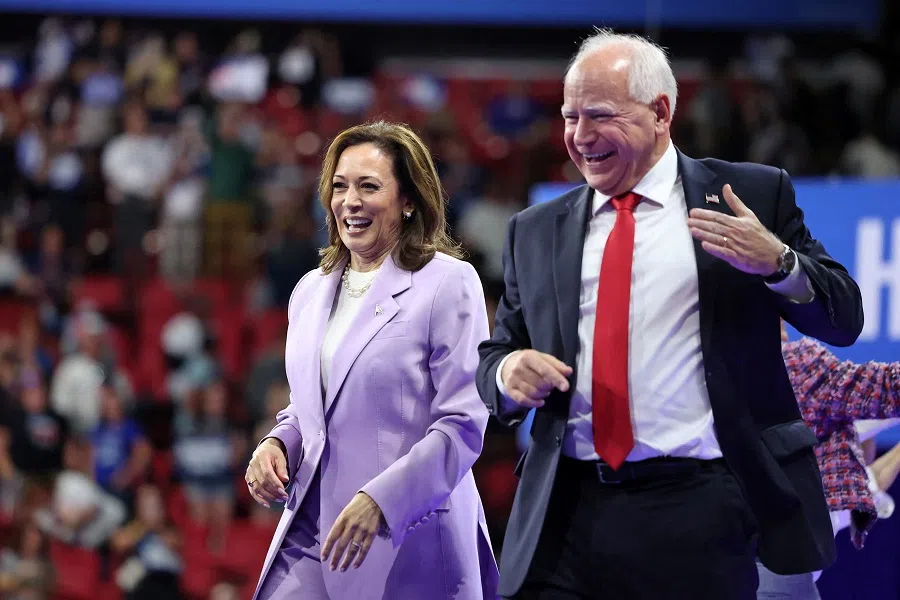 US Vice-President and Democratic presidential candidate Kamala Harris (left) and Minnesota governor and Democratic vice-presidential candidate Tim Walz at a campaign rally at the Thomas and Mack Center, University of Nevada in Las Vegas, Nevada, 10 August 2024.