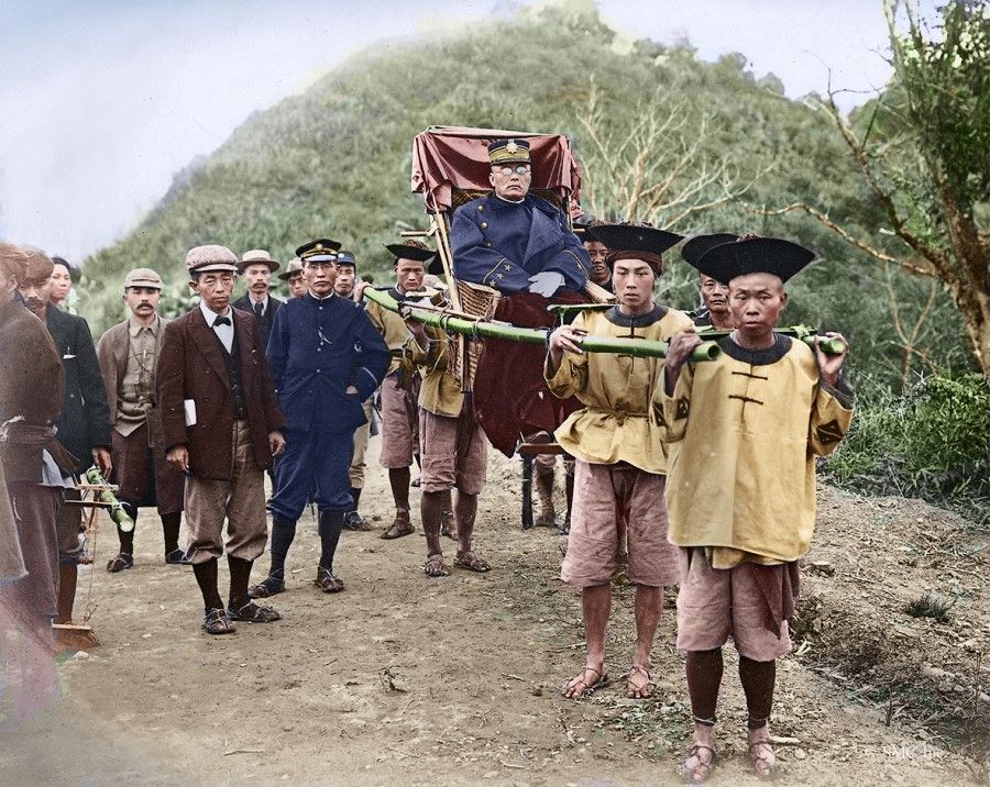 Japanese police in the 1910s, patrolling the mountain areas riding Taiwanese sedans, showing the air of colonisers.
