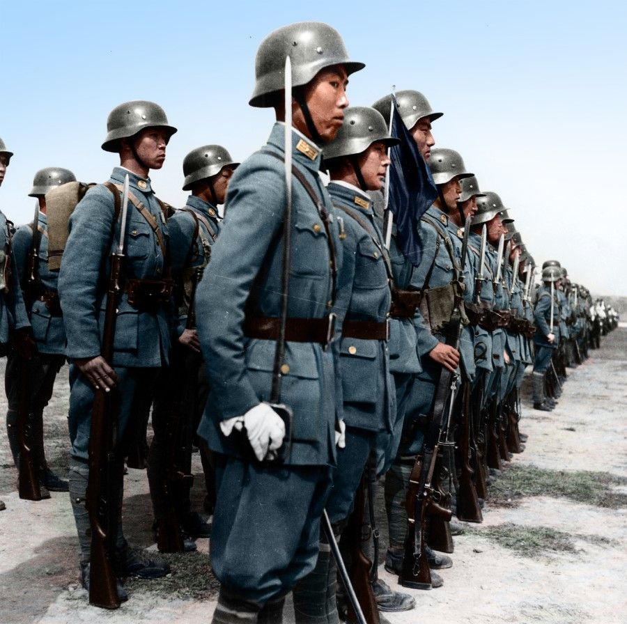 Battle of Shanghai, 1937: Chinese army instructors fitted out German-style go through an inspection, ready to fight the Japanese elite troops on the front line. In the 1930s, the Republic of China government purchased a large number of weapons and equipment from Germany, and invited German military advisors to help with training. Twenty divisions were fitted with modern weapons, and became an important force in China's war efforts.