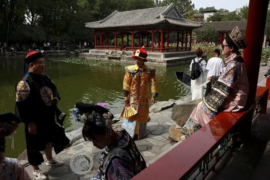 Tourists wearing Qing dynasty costumes visit Prince Kung's Mansion on National Day, the first day of China's eight-day Golden Week holiday, in Beijing, China, on 1 October 2025.