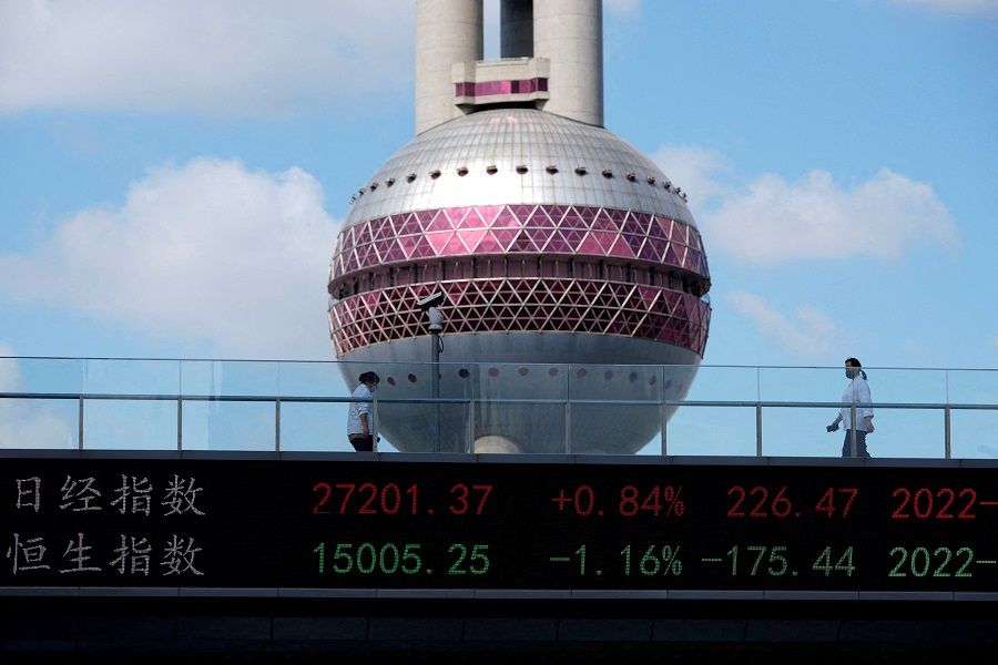 An electronic board shows the Hang Seng Index, at the Lujiazui financial district, in Shanghai, China, 25 October 2022. (Aly Song/File Photo/Reuters)