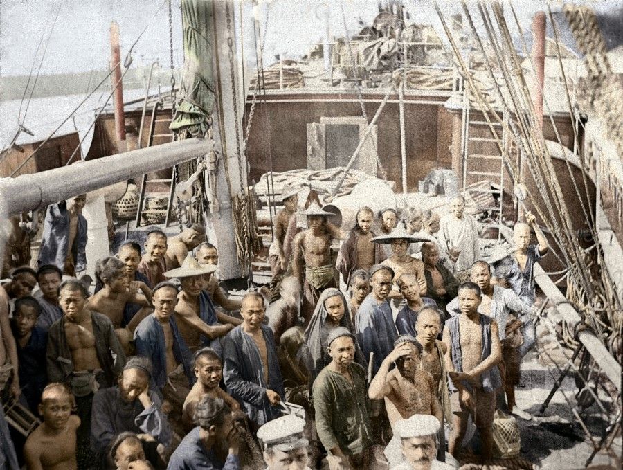 A boat arriving in Singapore with coolies, circa 1900. The coolies step out of the hold and stand on deck for a photograph taken by the German boat owner. This is a rare and valuable image because there are generally no photographs of early Chinese coolies. Coloured using modern image-processing technology, the photograph takes us right back to that boat deck a century ago, giving us a hint of how these coolies must have looked and felt upon arriving at their destination.