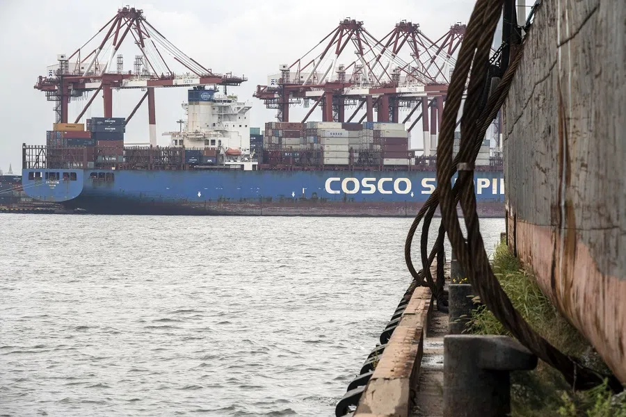 A COSCO Shipping container ship is loaded at the Port of Tianjin in Tianjin, China, on 5 September 2021. (Gilles Sabrie/Bloomberg)