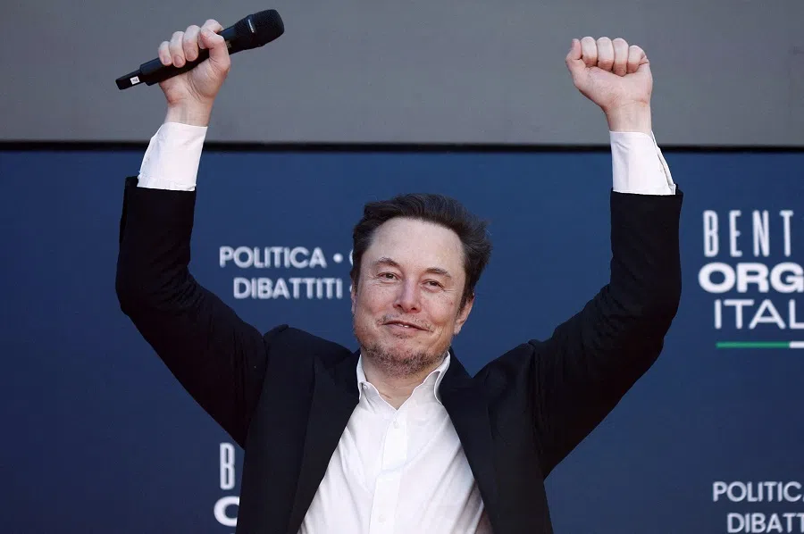 Tesla and SpaceX’s CEO Elon Musk gestures, as he attends political festival Atreju organised by Italian Prime Minister Giorgia Meloni’s Brothers of Italy (Fratelli d’Italia) right-wing party, in Rome, Italy, on 16 December 2023. (Guglielmo Mangiapane/Reuters)