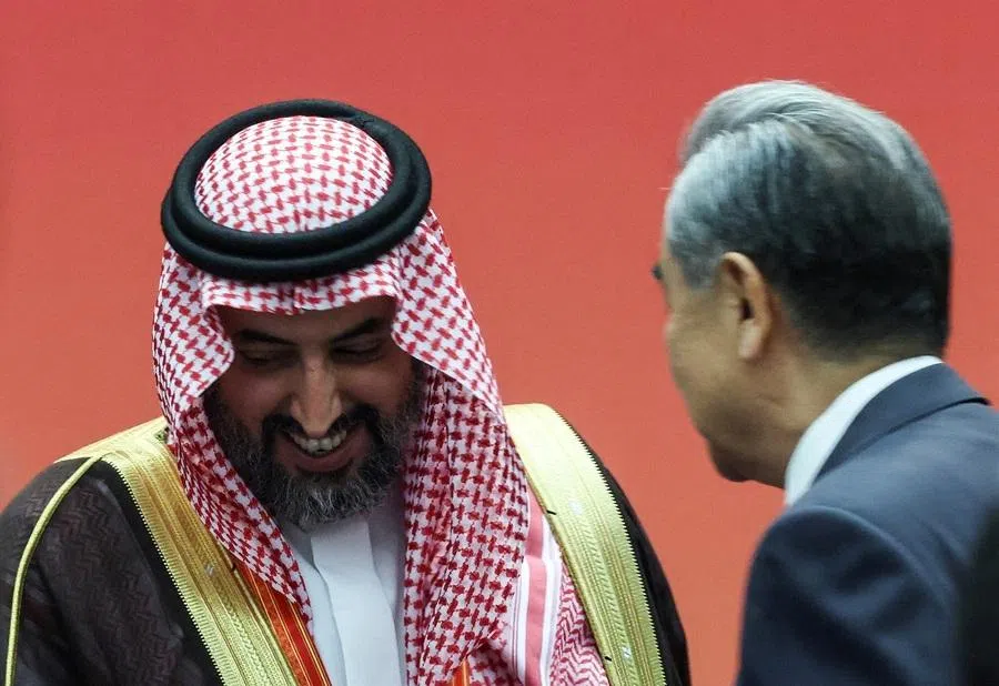Saudi Arabia’s ambassador to China Abdulrahman Al-Harbi reacts while speaking to China’s Foreign Minister Wang Yi during the presentation ceremony of the Foreign Ministry of China’s Outstanding Diplomat Medal, in Beijing, China, on 18 May 2026.