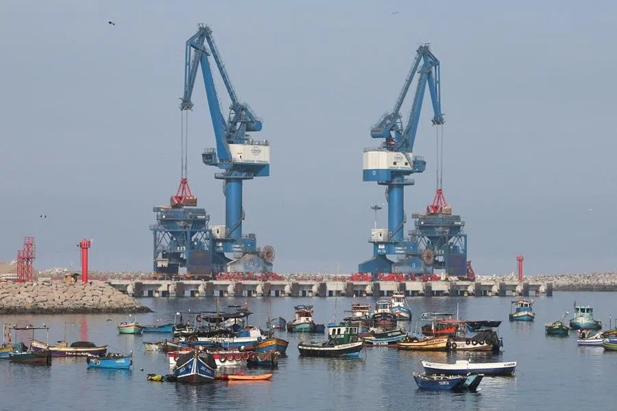 Boats in the water, in front of cranes at the Chinese-built Chancay megaport operated by Cosco Shipping, in Chancay, Peru, on 23 February 2026.
