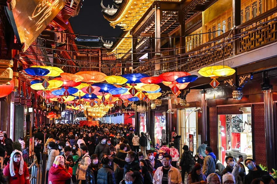 People visit the Yu Garden in Shanghai, China, on 5 February 2023. (Hector Retamal/AFP)