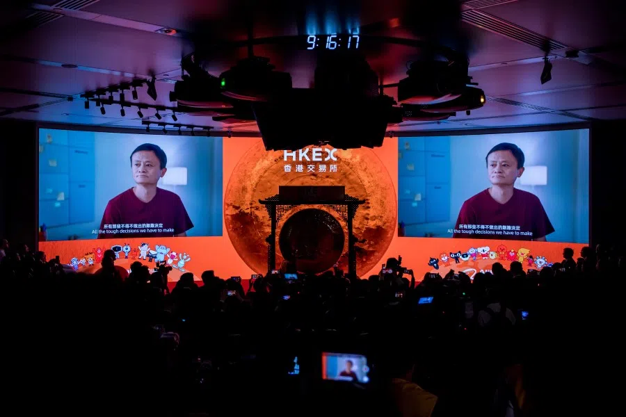 Jack Ma, former chairman of Alibaba Group Holding Ltd., is displayed on screens during the company's listing ceremony at the Hong Kong Stock Exchange. (Paul Yeung/Bloomberg)