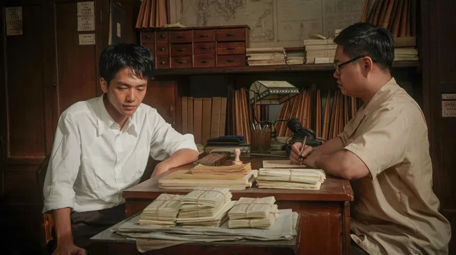 A scene from Dear You showing a letter writer.