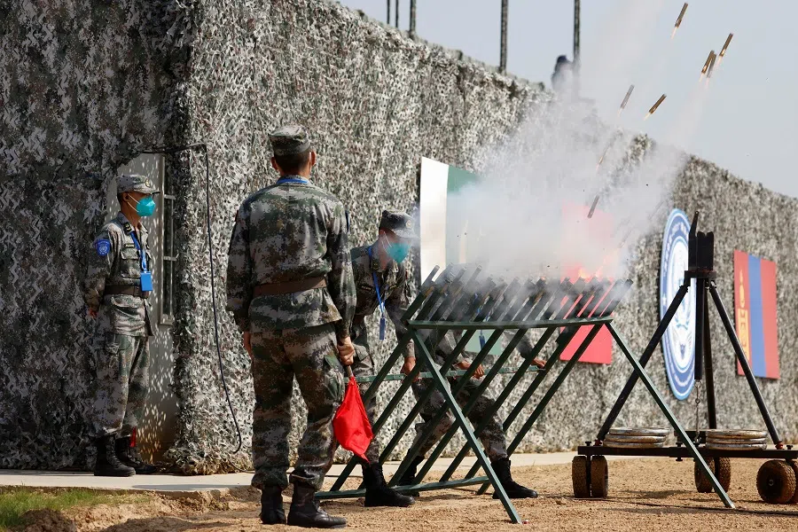 Soldiers of China's People's Liberation Army (PLA) take part in a joint multinational UN peacekeeping military exercise with troops from Pakistan, Mongolia and Thailand, on the outskirts of Zhumadian, Henan province, China, 15 September 2021. (Carlos Garcia Rawlins/Reuters)